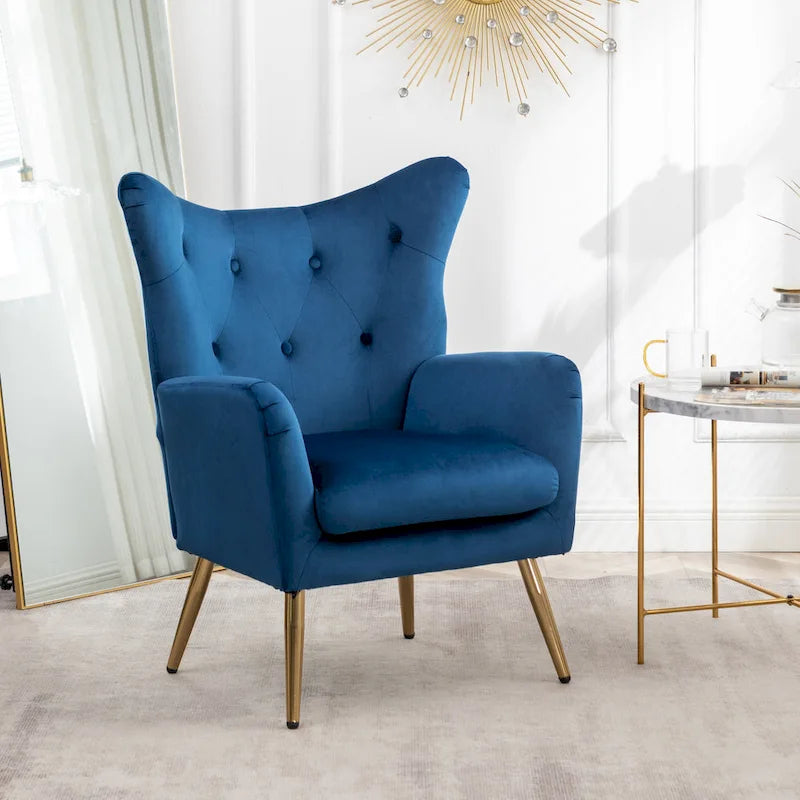 Fauteuil d’appoint à dossier haut et ailes, capitonné avec boutons, en velours