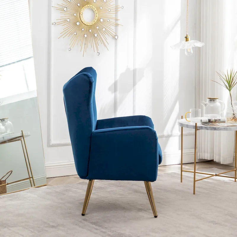 Fauteuil d’appoint à dossier haut et ailes, capitonné avec boutons, en velours