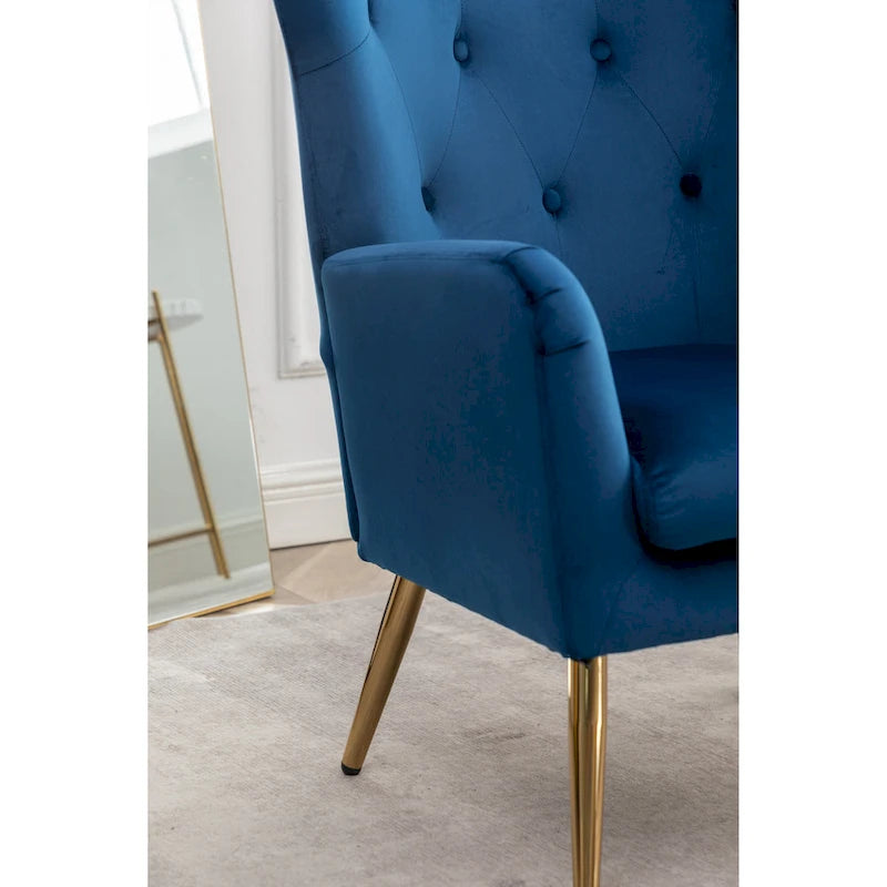 Fauteuil d’appoint à dossier haut et ailes, capitonné avec boutons, en velours