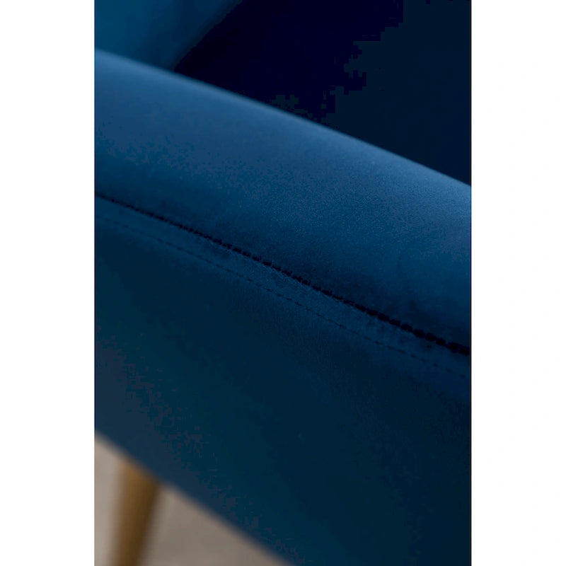 Fauteuil d’appoint à dossier haut et ailes, capitonné avec boutons, en velours