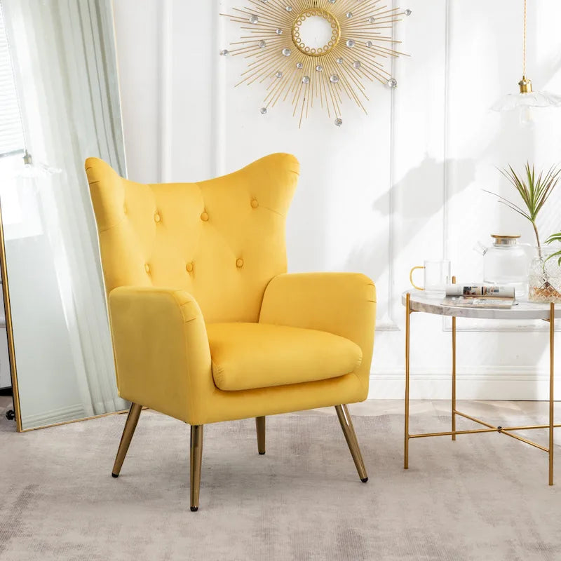 Fauteuil d’appoint à dossier haut et ailes, capitonné avec boutons, en velours