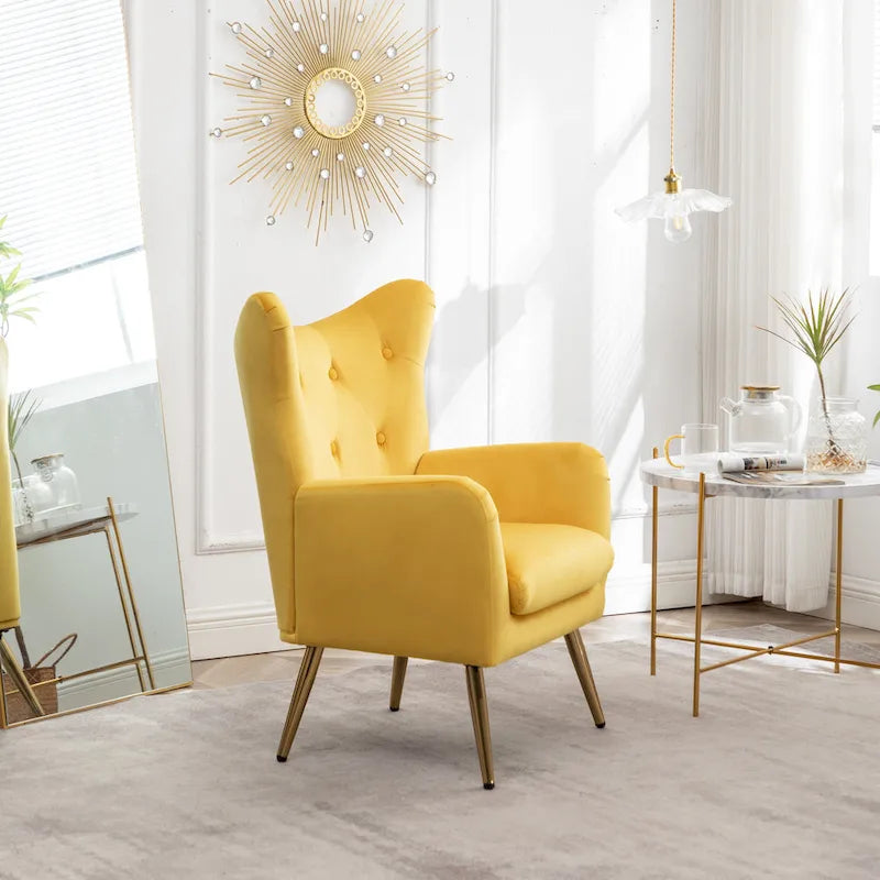 Fauteuil d’appoint à dossier haut et ailes, capitonné avec boutons, en velours