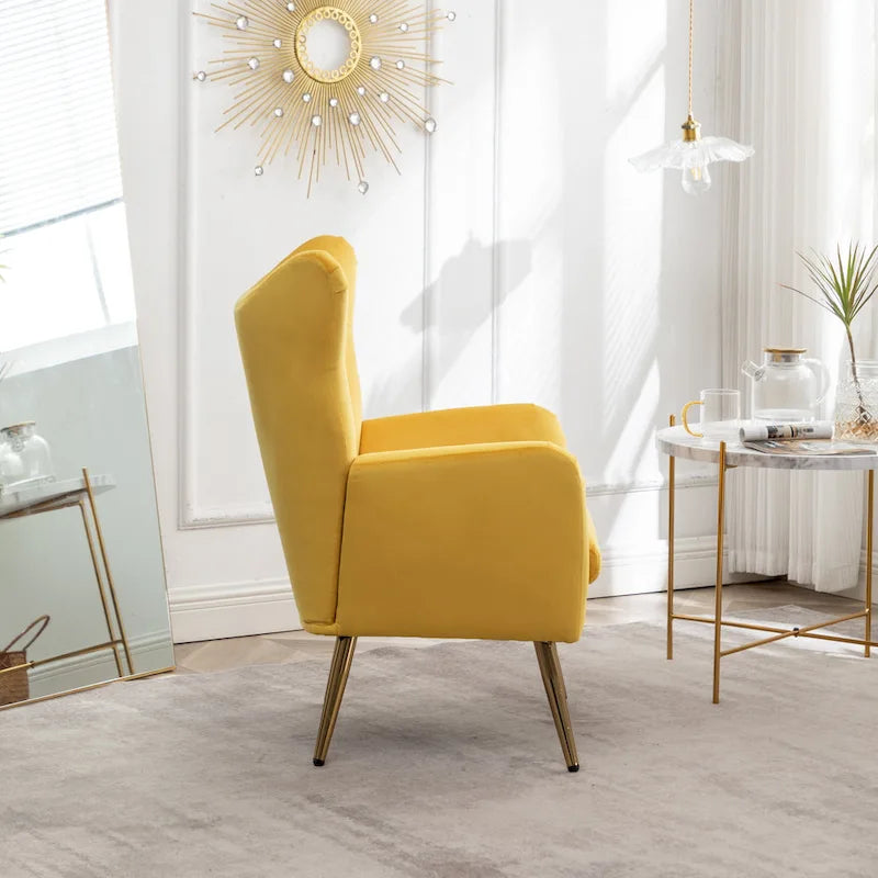 Fauteuil d’appoint à dossier haut et ailes, capitonné avec boutons, en velours