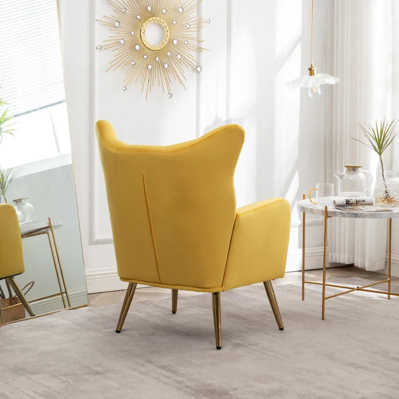 Fauteuil d’appoint à dossier haut et ailes, capitonné avec boutons, en velours
