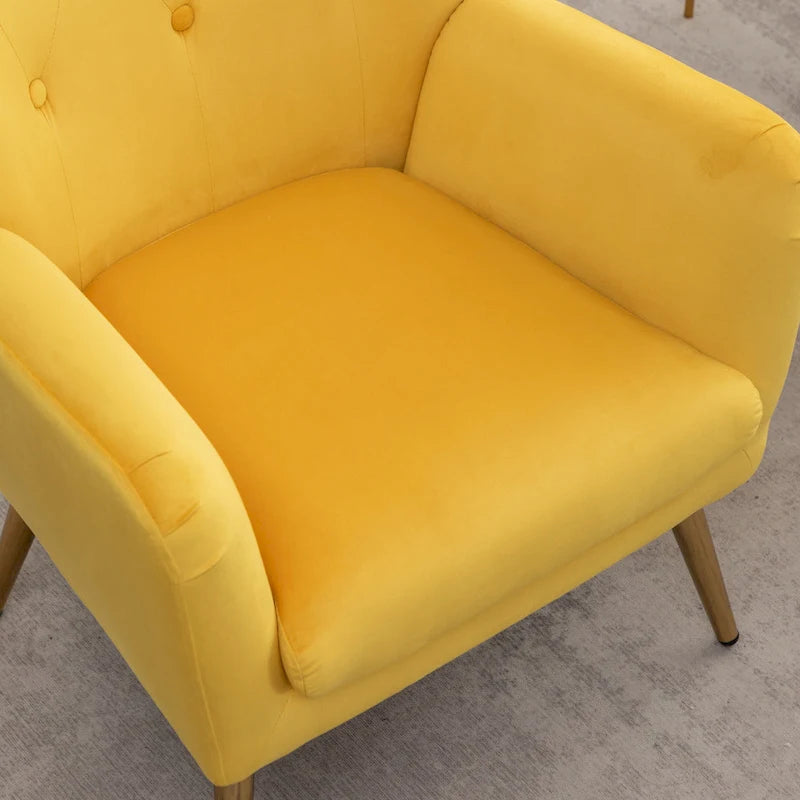 Fauteuil d’appoint à dossier haut et ailes, capitonné avec boutons, en velours