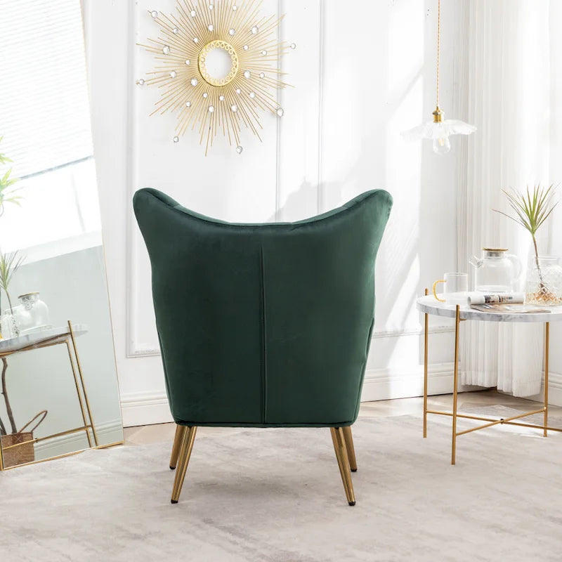 Fauteuil d’appoint à dossier haut et ailes, capitonné avec boutons, en velours
