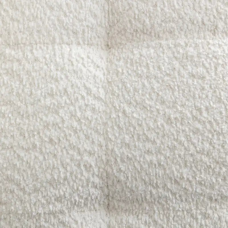 Gesteppter Bouclé-Akzentstuhl – übergroßer Slipper-Stil